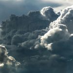 Belize starts the week under cloudy skies as rain chances linger