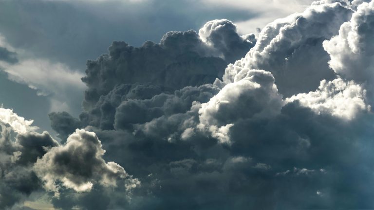 Belize starts the week under cloudy skies as rain chances linger