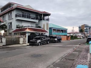 Three vehicles belonging to a prominent Belizean family were destroyed in a suspected arson attack early on Sunday, causing damages estimated at nearly half a million Belize dollars, authorities said.