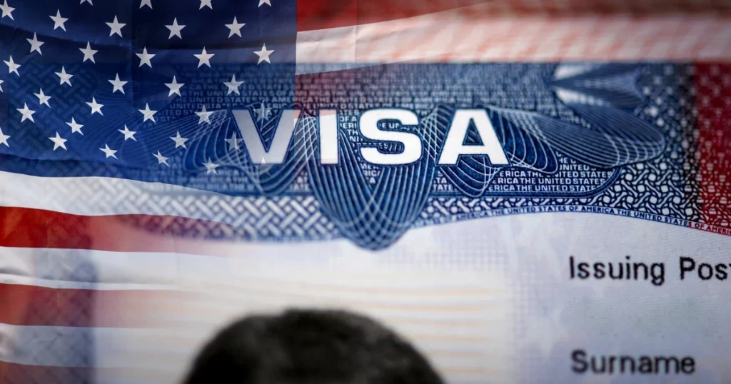 Hospital worker scammed in fake U.S. visa scheme, co-worker wanted