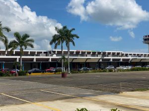 Man collapses and dies outside PGIA after dropping off family