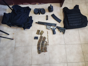 Mangrove search yields rifles, ammunition, and body armor