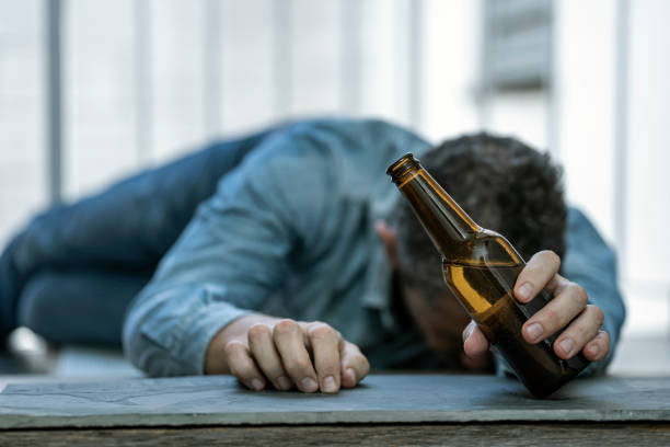 Man discovered asleep with bottle of rum