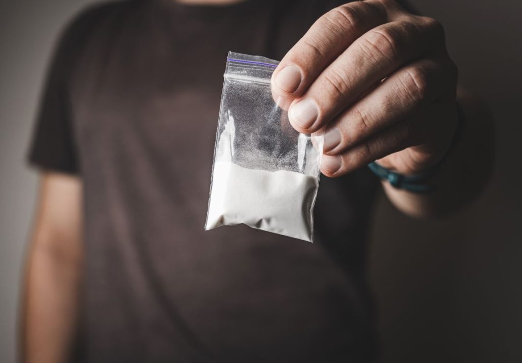 He dropped it two feet away, and police went back for it