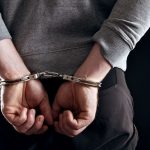 hands-locked-in-handcuffs-felony-arrest