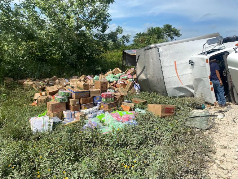 Truck flips, spills goods along Santander road