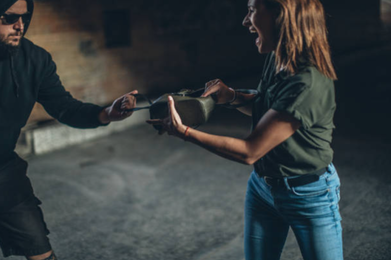 Two men steal woman’s purse during late night walk in Trial Farm
