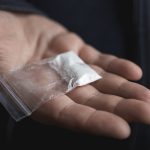 Police tip uncovers 24 live rounds and cocaine stash in Orange Walk